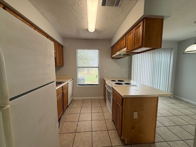 Building Photo - Gulf Breeze - Villa Woods - 2 bedroom, 1.5 bathroom