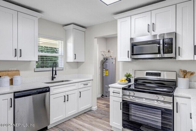 Building Photo - Waterfront 3 BR 2 BA Remodeled Rental Home