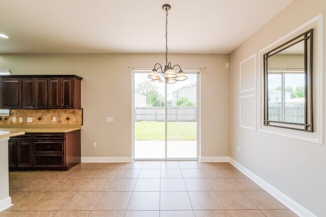 Building Photo - 9548 Simeon Dr