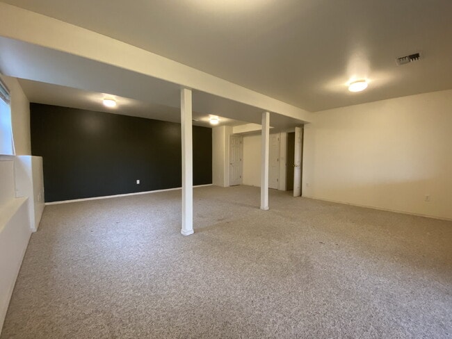 Building Photo - Spacious 4-bedroom with Panoramic Deck Nex...