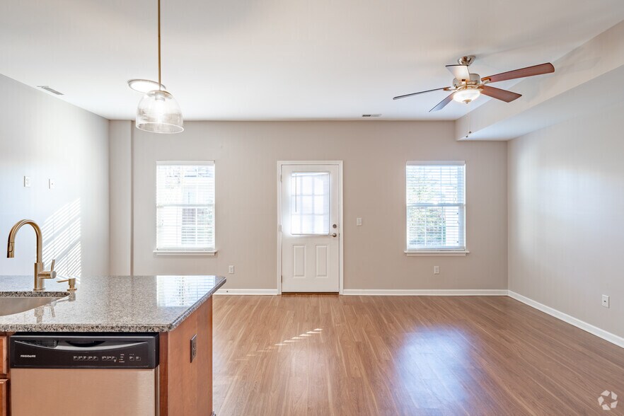 2BR, 2.5BA - 1,459SF - Living and Dining Area - Hunt Club Circle Townhomes