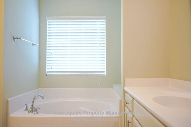 Building Photo - Charming End-Unit Townhome with Bonus Room, Screened Porch & 2-Car Garage – Convenient to RTP, RD...