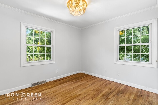 Building Photo - Beautifully Updated Three-Bedroom with Koi...