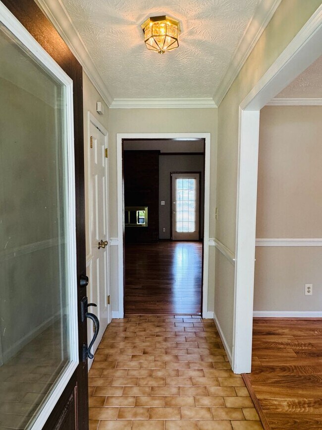 Building Photo - 3-Bedroom home is sure to captivate from t...