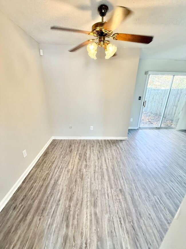 Building Photo - *** RENT READY!! Newly remodeled townhome! ALL Laminate.