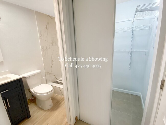 Building Photo - "Charming Bellevue Retreat: Spacious 2-Bed, 2-Bath with Finished Basement!"