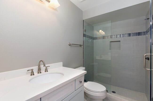 Building Photo - Lake and Golf Course View- Remodeled Condo w/ 2 Car Garage!