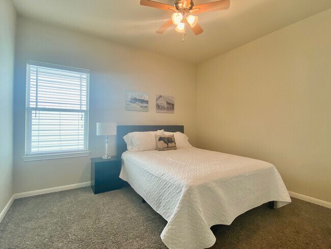 Building Photo - This charming two-story home, built in 2018, offers a spacious open floor plan perfect for casual...