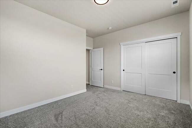 Building Photo - Brand New, Stylish 4-Bedroom Home with Vaulted Ceilings and Private Patio