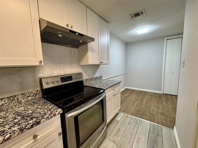 Building Photo - 5981 Arapaho Rd