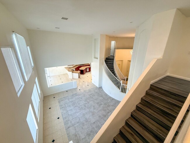 Building Photo - SPACIOUS HOME IN GATED COMMUNITY WITH POOL, RV PARKING & 4-CAR GARAGE!