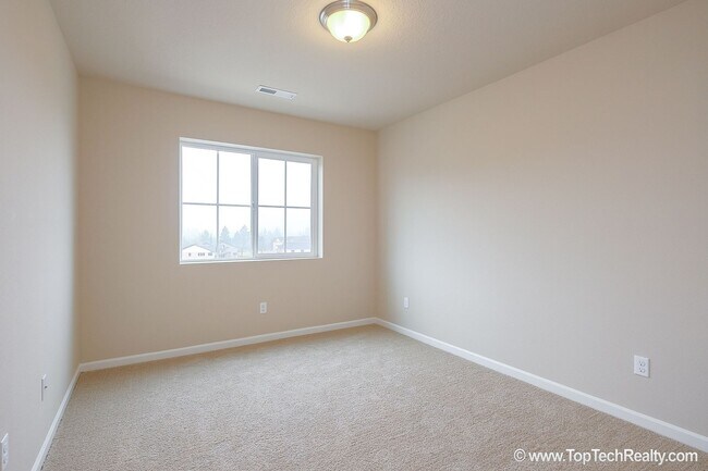 Building Photo - Spacious 4-Bedroom + Office Home in Abbey Creek – Modern Finishes, EV Charger & Low-Maintenance B...