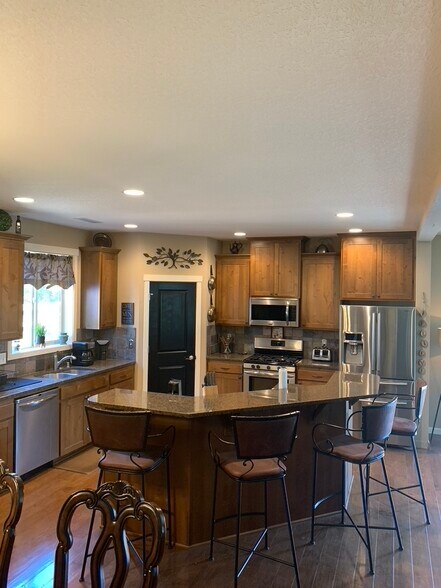 Bar seating for 4. - 5401 NE 66th Dr