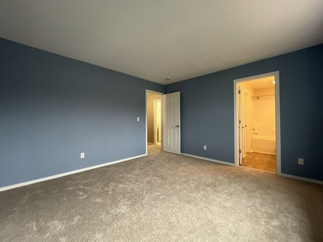 Building Photo - Inviting Two-Story 3BR Home Featuring New Carpet, New Stainless Appliances, Spacious Garage Stora...
