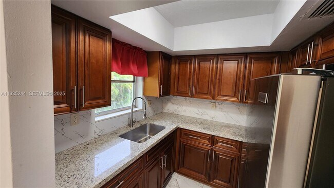 Building Photo - 3090 Coral Springs Dr