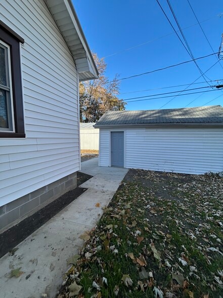 sidewalk and approach to small garage - 410 S 4th St