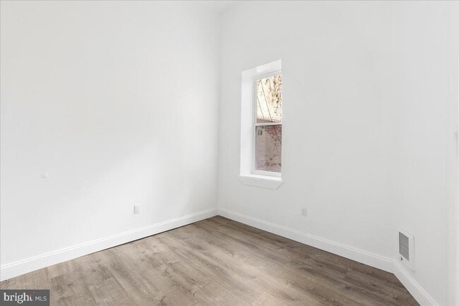 Building Photo - 6940 Woodland Ave