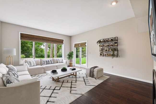 Sunlit and spacious living room with access to the patio - 1541 Hollybrook Rd