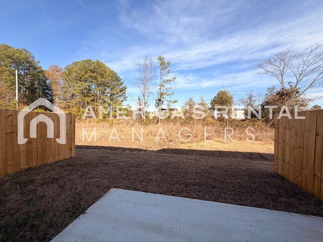 Building Photo - Spacious Two-Story Townhome with Open Layout!