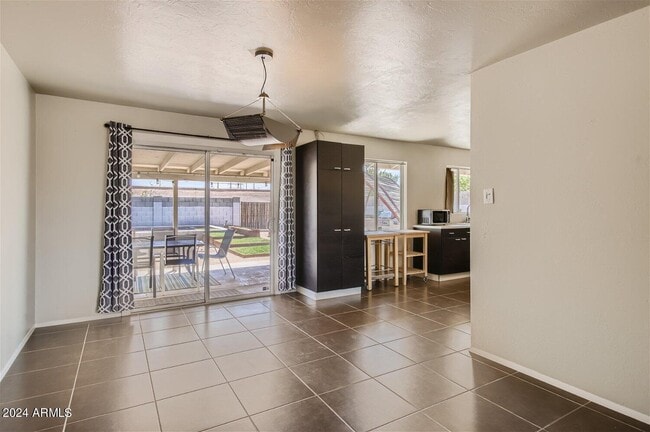 Building Photo - 3213 N 63rd Pl