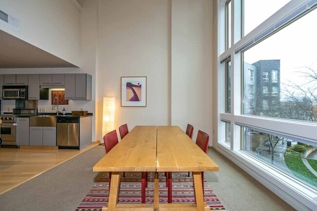 Building Photo - Gorgeous loft-style 2 floor condo with secured parking, A/C and rent includes most utilities!