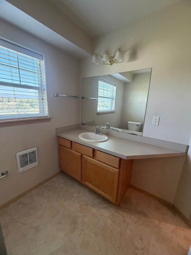 Building Photo - Charming 2-Story Townhome with Vaulted Ceilings