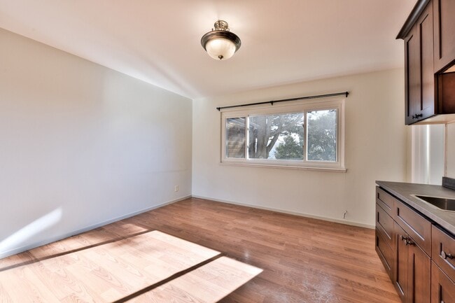 Building Photo - Light filled home+ Pet Friendly + Deck+ Lo...