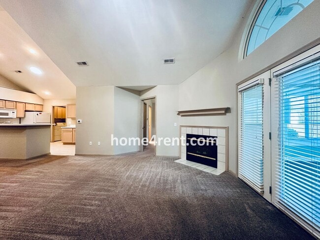 Building Photo - Maintenance FREE, Ranch Style Townhome w/ ...