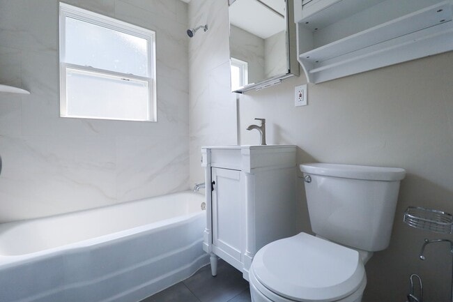 Building Photo - Step into this beautifully updated, move-i...