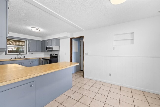 Building Photo - 7681 Garrison Ave