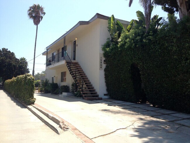 Driveway to open parking spaces - 12946 Walsh Ave