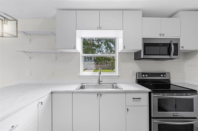 Building Photo - 6708 S Juanita St