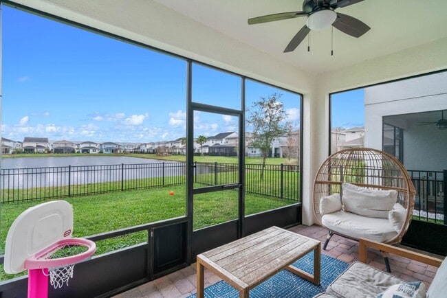 Building Photo - Water Front Home- 4 Large Bedrooms-3 baths Gated Community Call Sheila Campbell 407-687-7900
