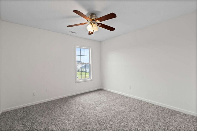 Building Photo - Spacious 4-Bedroom Gem with 2.5 Baths in t...