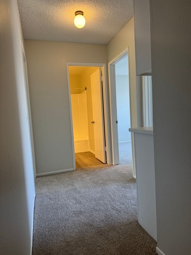 Building Photo - COMING SOON! 3 Bed + 1.5 Bath Townhouse