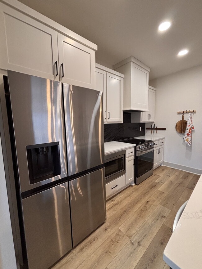 Building Photo - Need Space?  How about 5 bedrooms, 2.5 baths + an extra bonus area upstairs so that the kids can ...