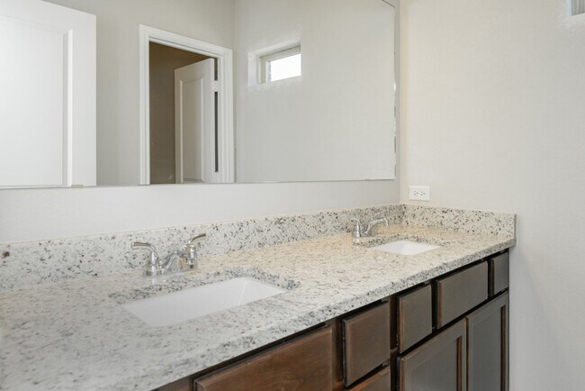 Building Photo - Live, love, and grow in this charming townhome!