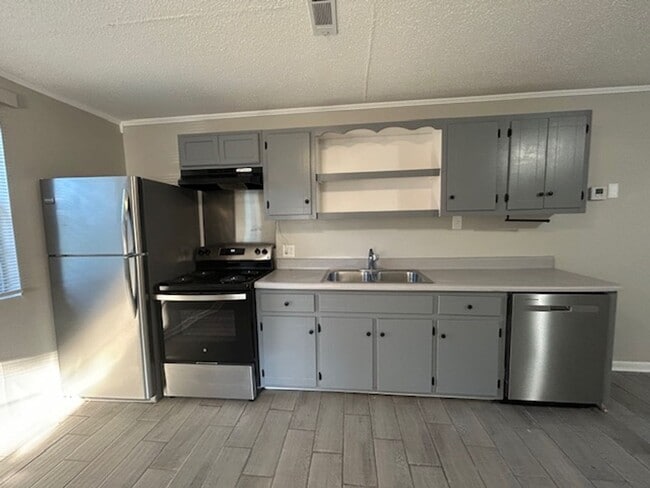 Building Photo - Call Property Manager Tonia Rollins at (50...