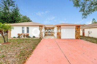Building Photo - 4 Bedroom Pet-Friendly Home in Tarpon Springs, FL with Main Street Renewal
