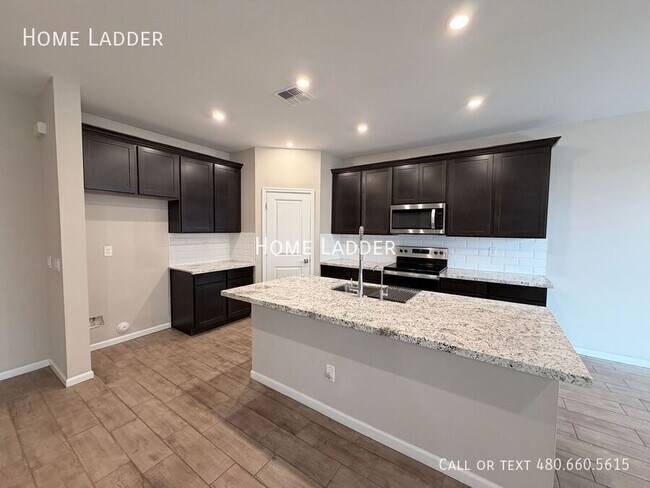 Building Photo - 1997 E Wetleaf Pl