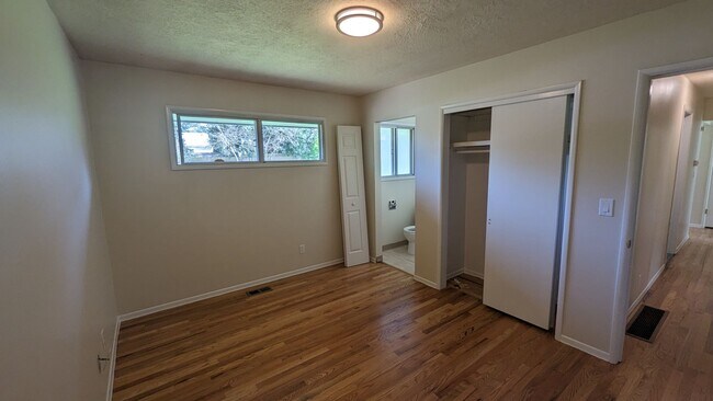 Building Photo - Spacious Three Bedroom with Large Backyard...