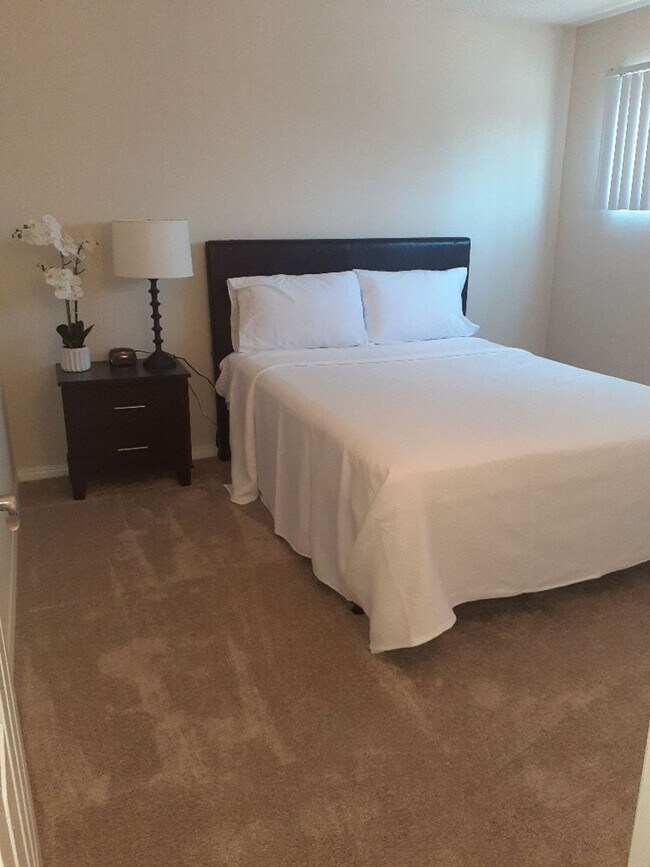 Building Photo - Welcome home to Seabreeze Garden Apartments