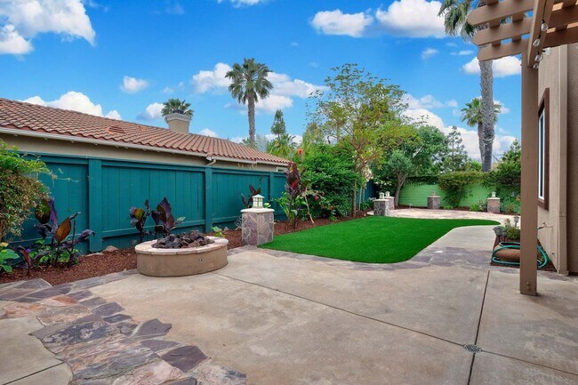 Building Photo - Gated corner lot home walking distance to the beach