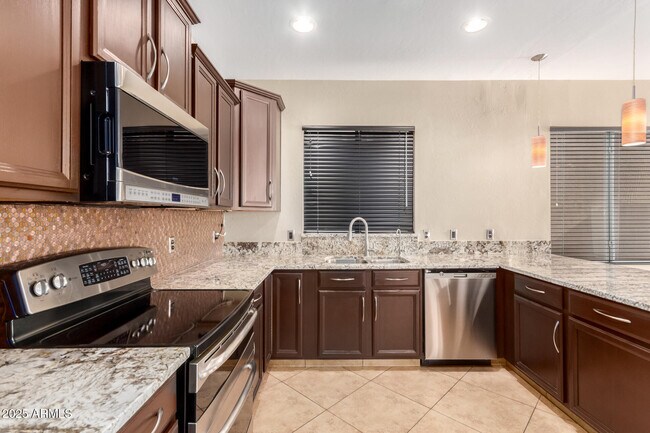 Building Photo - 8721 E Lomita Cir