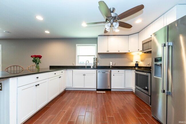 Building Photo - 7122 Woods Dr