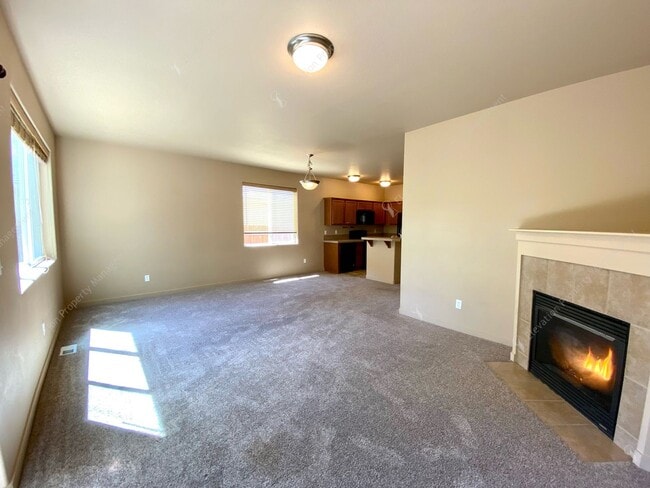 Building Photo - 3  BR home with new flooring in a great NE...