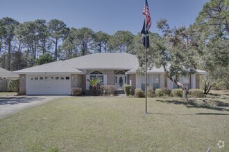 Building Photo - 4 bedroom 3 bathroom brick home in Gulf Br...