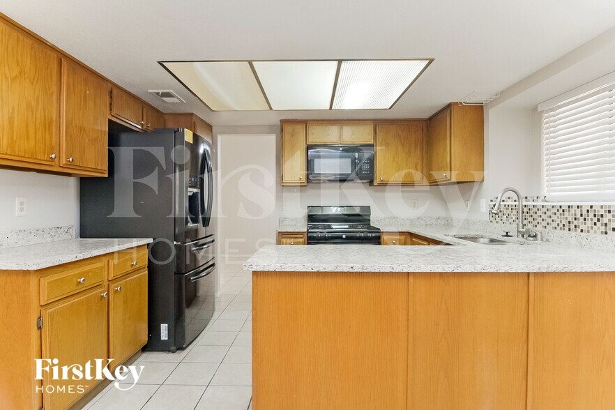 Building Photo - 7034 Rusty Nail Way