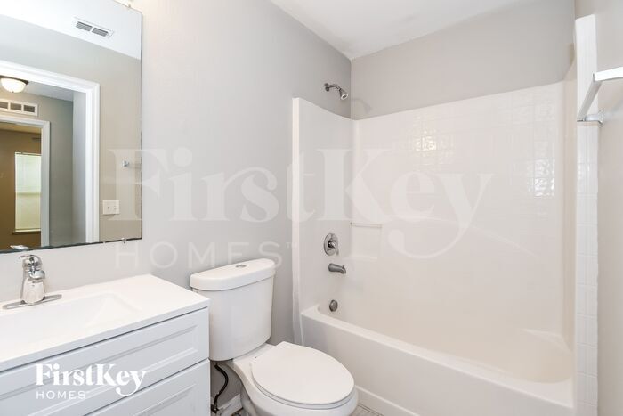 Building Photo - 6565 Gentle Oaks Dr