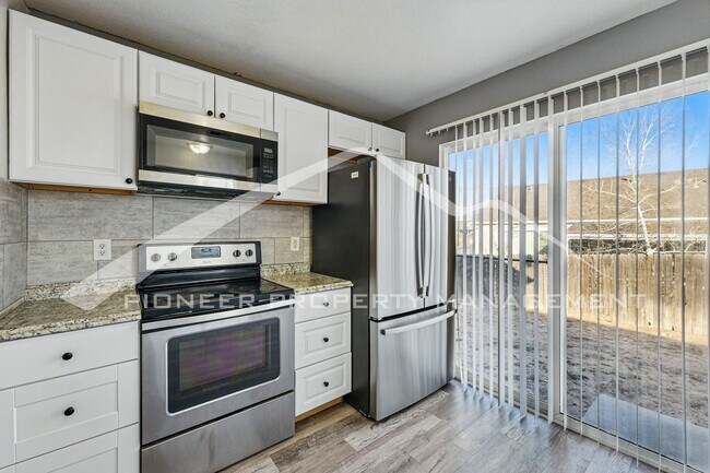 Building Photo - Spacious 3-Bedroom Home with Modern Features and Private Yard